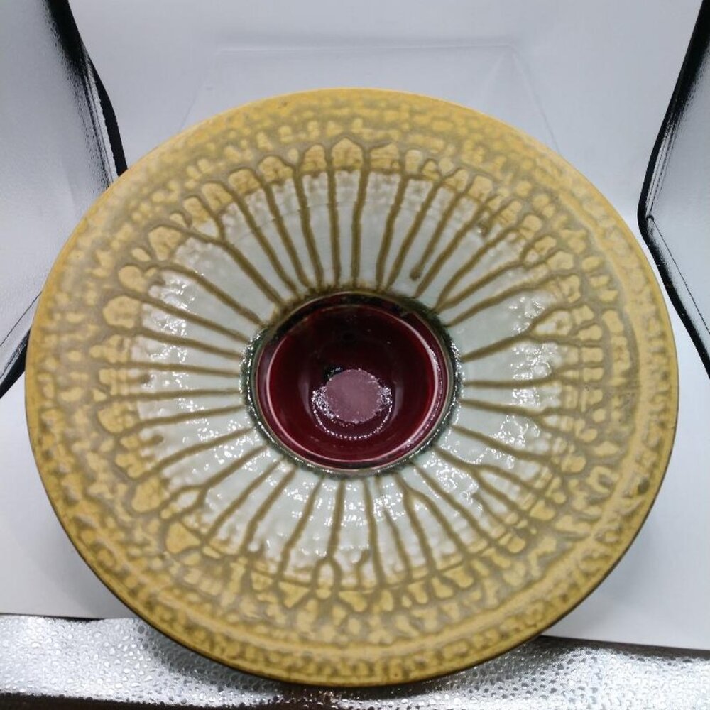 Handcrafted Ceramic Bowl With Intricate Yellow/White Pattern And Deep Red Center